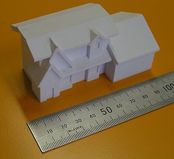 Ausgedrucktes Papiermodell eines Hauses